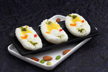 Cham Cham Mithai Also Called Rasgulla Malai Chaap, Chomchom Or Rosogolla Chamcham Is Made Of Milk, Mawa, Khoya, Pista, Kesar, Khova, Paneer, Chenna, Chhena, Dry Fruits Stuffing And Dunked In Chasni