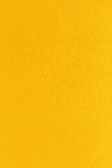 Naklejka premium Gold or yellow paint on cement wall texture background.