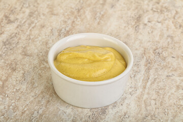 Organic mustard sauce in the bowl