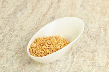 Crunched roasted peanut in the bowl