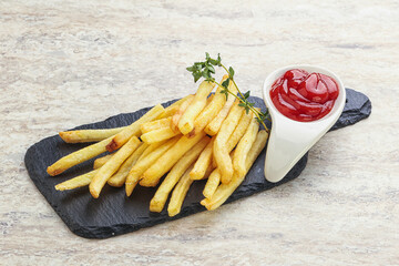 French fried potato over board