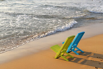 Fototapeta na wymiar Chair for relaxing in a cafe on the Mediterranean coast