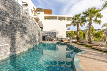 Sea hotel resort with swimming pool in the morning