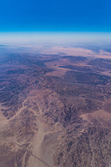 Fototapeta na wymiar Aerial view of Joshua Tree National Park with blue sky horizon