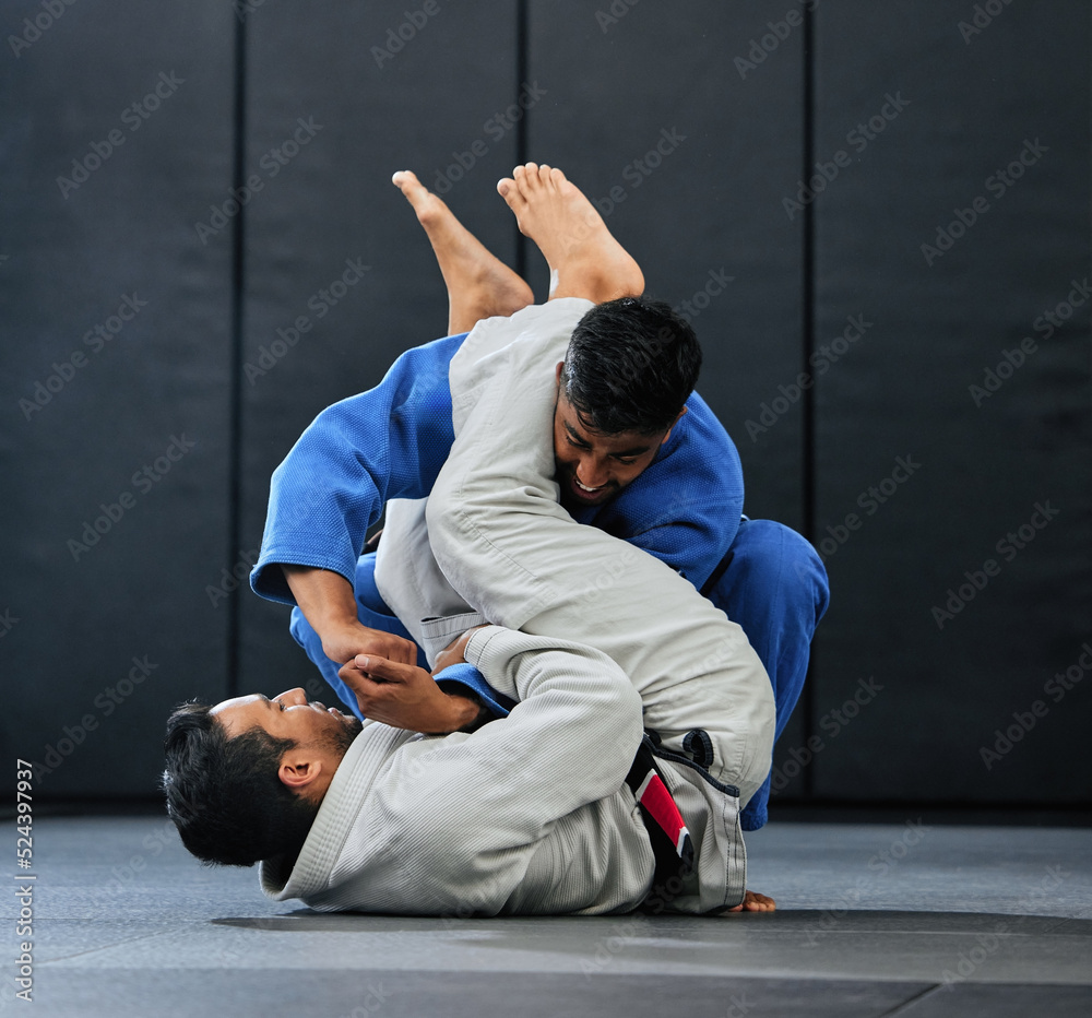 Sticker . Men fighting during karate training at fitness studio, doing fight club workout at gym and learning dojo moves as exercise at sports center. Strong, fit and tough people doing physical activity.