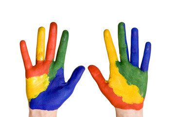 Child hands painted in colorful paints