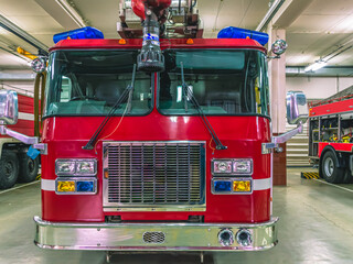 A fire truck for the delivery of firefighters to the place of fire and the supply of extinguishing agent for extinguishing. Equipment for rescuing people in case of fire. Emergency rescue service. 