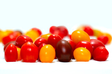 Fresh cherry tomato with a multishade of color. Red, black red, yellow.