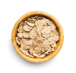 Whole grain cereal flakes in bowl. Wholegrain breakfast cereals isolated on white background.