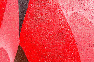 Closeup of colorful pink, red, coral urban wall texture. Modern pattern for wallpaper design. Creative modern urban city background for advertising mockups. Minimal geometric style, solid colors