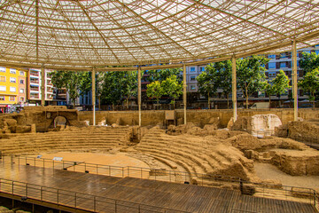 beautiful ruins of the ancient Roman amphitheater in Zaragoza Spain Museo del Teatro de Caesaraugusta - obrazy, fototapety, plakaty