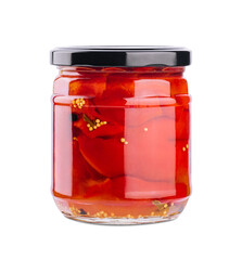 Sweet red peppers in a glass jar isolated on a white background