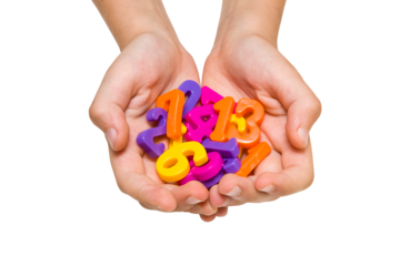 Child hands holding color plastic numbers