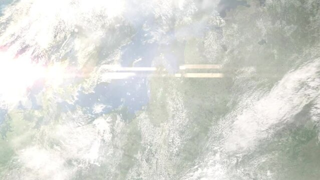 Earth zoom in from outer space to city. Zooming on Telsiai, Lithuania. The animation continues by zoom out through clouds and atmosphere into space. Images from NASA