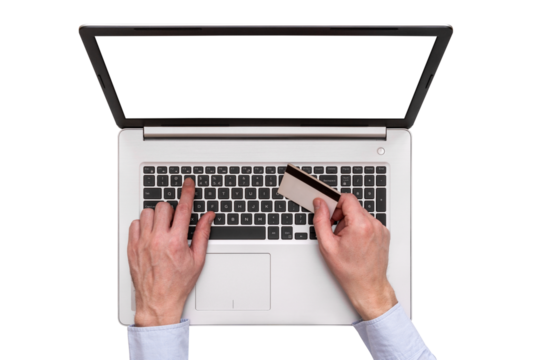 Hands holding credit card and using laptop