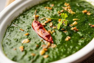 lasooni palak recipe or dhaba style garlic spinach curry, Indian main course served with naan