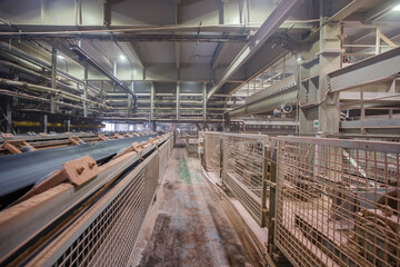 Conveyor belt equipment in factory workshop.