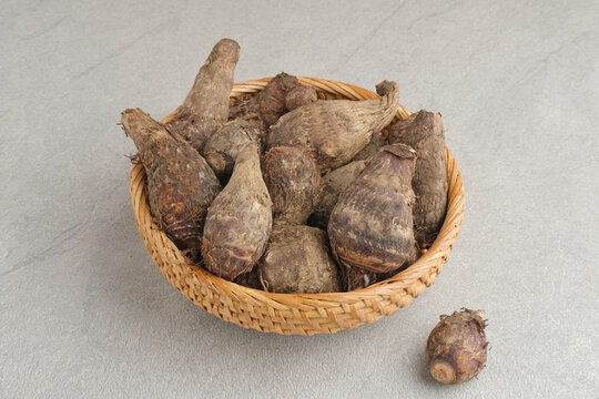 Taro, Talas belitung, kimpul or bentul, are starchy tubers that can be eaten. Served boiled or steamed.