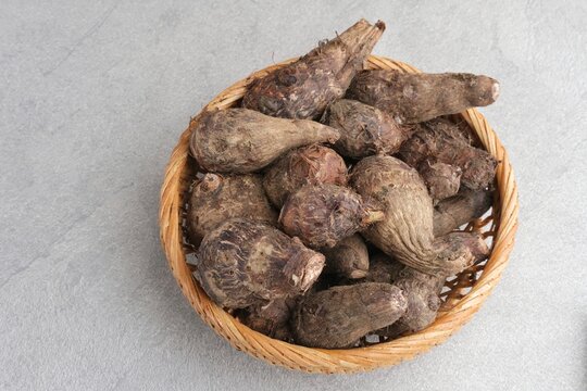 Taro, Talas belitung, kimpul or bentul, are starchy tubers that can be eaten. Served boiled or steamed.