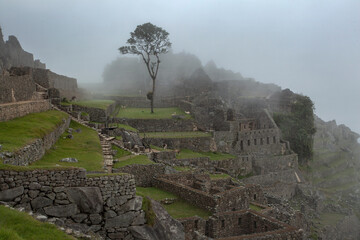 Machu Picchu ancient city view from Huchu'y Picchu in cloudy weather