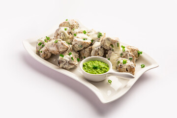 vegetarian soya malai chap made using soya chaap with white creamy gravy