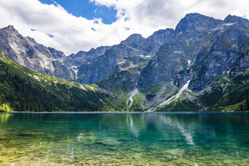 Lake of Morskie Oko or Eye of the Sea, in the High Tatras mountain range of Tatra National Park - obrazy, fototapety, plakaty