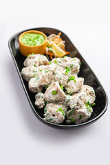 vegetarian soya malai chap made using soya chaap with white creamy gravy