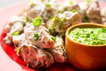 vegetarian soya malai chap made using soya chaap with white creamy gravy