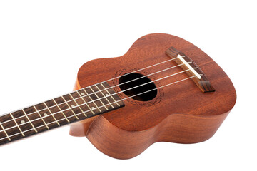 Wooden ukulele guitar isolated over white background.
