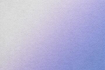 Texture of old blue and white paper background, with holographic gradient. Structure of craft very peri cardboard