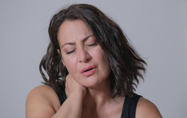 Fototapeta premium neck pain, woman with a sore neck 