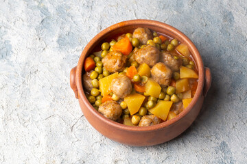 Turkish Food Green Pea Stew with Meatballs - Kofte or Kofta Bezelye. (Turkish name; kofteli bezelye)
