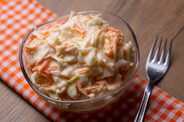 Coleslaw salad close up on a bowl. Cabbage, carrot salad. (Turkish name; lahana salatasi)