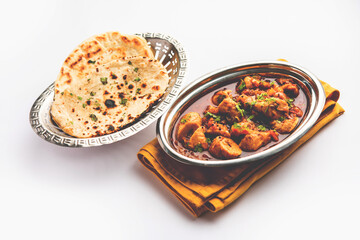 Punjabi soya chaap gravy or dhaba style soya chap masala sabzi served with naan