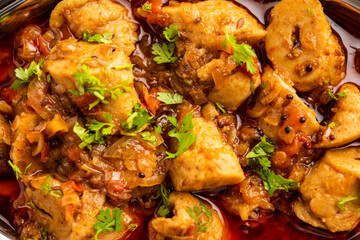 Punjabi soya chaap gravy or dhaba style soya chap masala sabzi served with naan