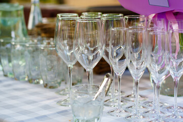 empty wine glasses on an open-air table. 