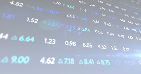 Image of financial data and graphs over blue background