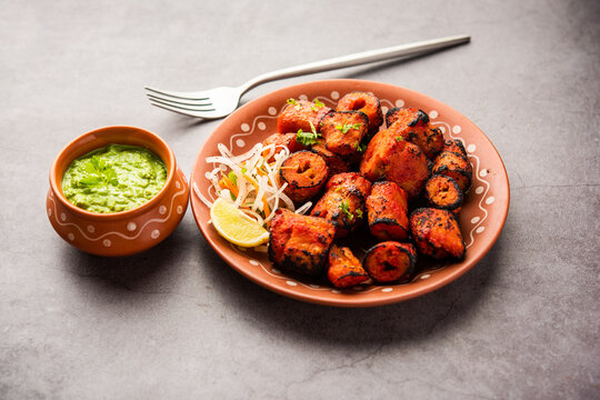 Tandoori Soya Chaap or soy chap dish prepared by marinating in tandoori spices, closeup view