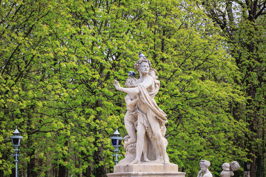 Statue of Hermaphroditus rejecting Salmacis in Lazienki - Royal Baths Park in Warsaw city, Poland