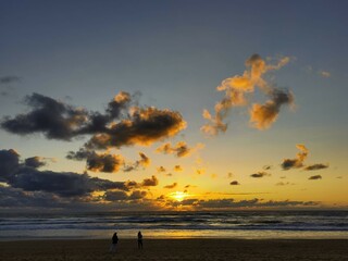 Sunset on the beach with clouds