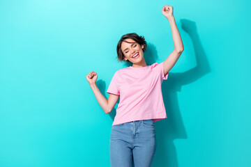 Photo of cool short hairdo young lady yell wear pink t-shirt jeans isolated on turquoise color...