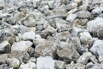 Pile of grey stones as background, closeup