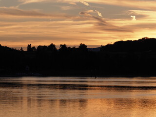 Naklejka premium Romantic sun set over Rhine River near Stein am Rhein in Switzerland
