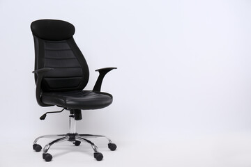 Fototapeta premium Comfortable office chair on white background, space for text
