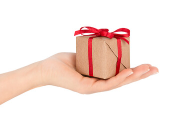 Female hand holding gift box isolated on white