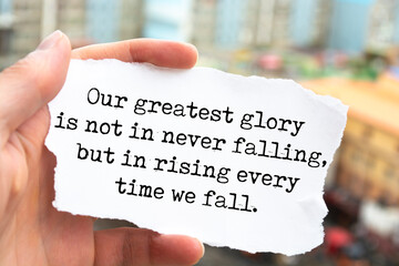 Inspirational motivational quote. Our greatest glory is not in never falling, but in rising every...