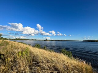 view of the Volga river, sunny day, dry grass