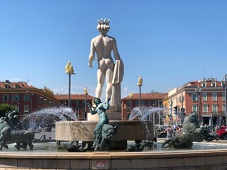 Fototapeta premium Beautiful place Massena fountain with Apollo, Nice, Côte d'azur, Mediterranean sea, France. Best Nice sightseeings and top French destinations