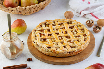 Pie with a lattice of pastry on the table