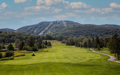 Golf Chateau Bromont Hole #18 on a beautiful summer day at the foot of Mont Bromont 